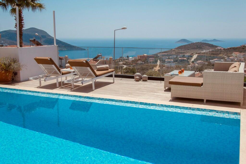 Sea View 3-Bedroom Furnished Villa with Private Pool for Sale in Kalkan Kızıltas